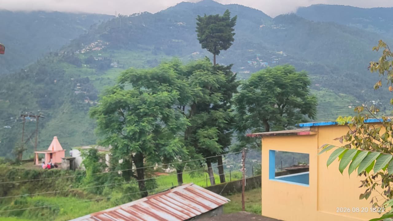 The valley below the school, with the temple that gave Ramashram its name